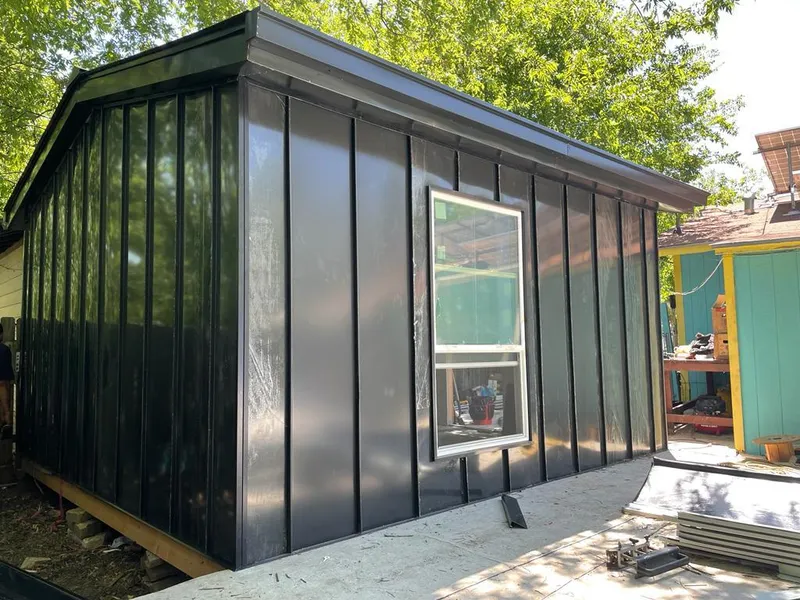 Black standing seam metal wall panels for Metal Roof Installation in Seekonk