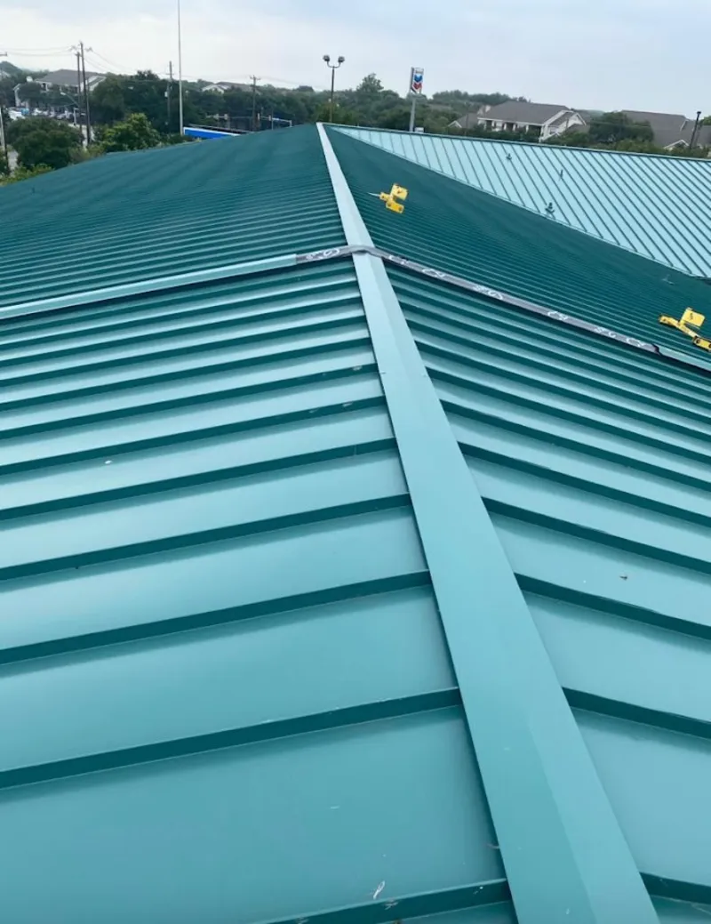 Green commercial metal roof ridge and valley for Metal Roof Repair in Seekonk