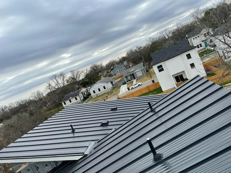Standing seam metal roof panels with vents for Skylight Repair in Seekonk